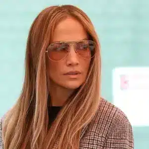 Jennifer Lopez Called ‘Worst Dressed,’ Rocking Disco Ball Outfit with Full Side Cutout at the 2024 TIFF