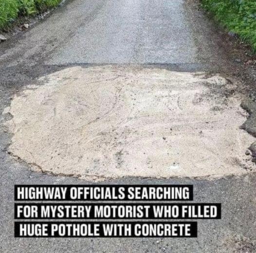 Driver Fills Pothole